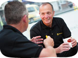  image of discussion over coffee with an AA trainee instructor
