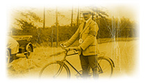 An AA man with his bicycle