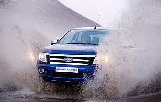 picture of car driving through water