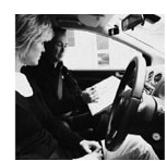 woman receiving driving instruction