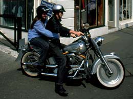 Motorcyclist and pillion passenger