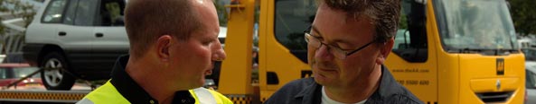 An AA Patrol talking to a person who's broken down