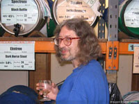 man with beer kegs