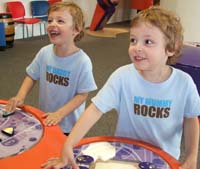 Boys enjoying an exhibit at Techniquest, Cardiff