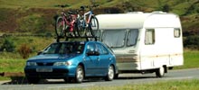 A car towing a caravan