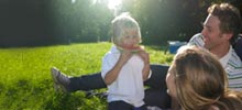 Family playing in a park