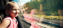 Girl looking out of train window