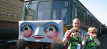 Family with toy train
