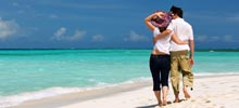 Couple walking along a beach