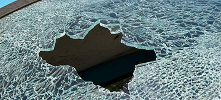 When struck toughened glass breaks into thousands of pieces