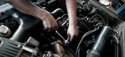 If a firm price is stated at the time of making the contract, then both you and the garage are bound by it 