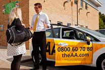 A driving instructor chats to a pupil