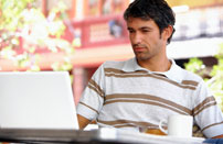 An instructor sat using a laptop