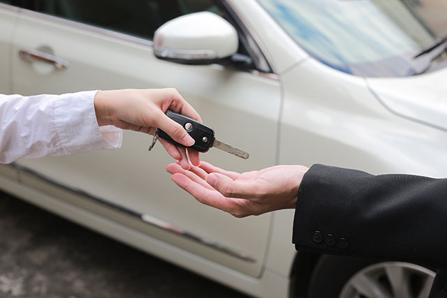 Handing over car keys to a named driver