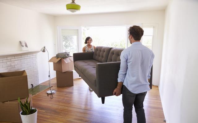 Home buyers checklist couple sofa