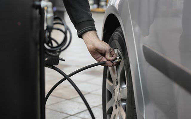 Car tyre being inflated