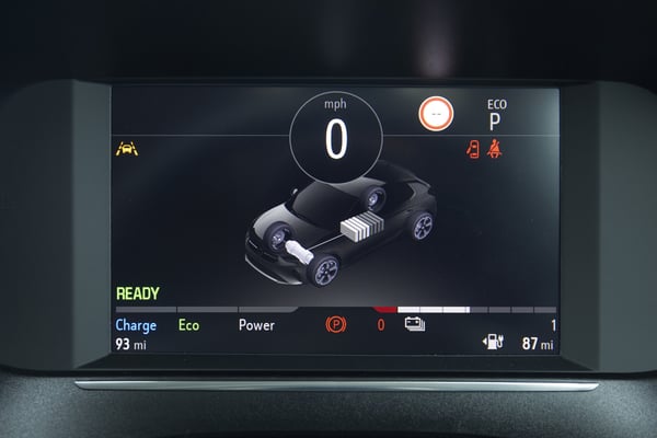The screen of the Vauzhall Corsa E displaying the statistics for power output and battery usage