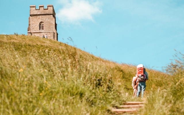 walking up to Glastonbury Tor in the sun