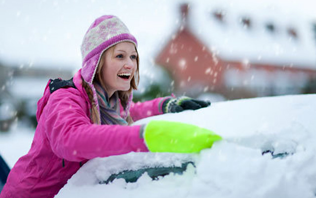 Snow girl scrapes ice