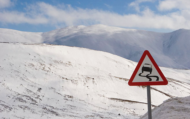 Winter snow burried sign