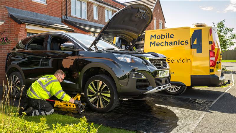 AA Patrol replacing car tyre