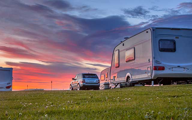 Caravans in a park in the evening