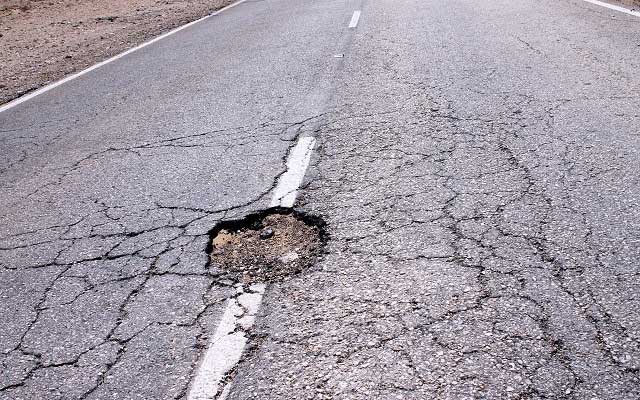 Pothole in road