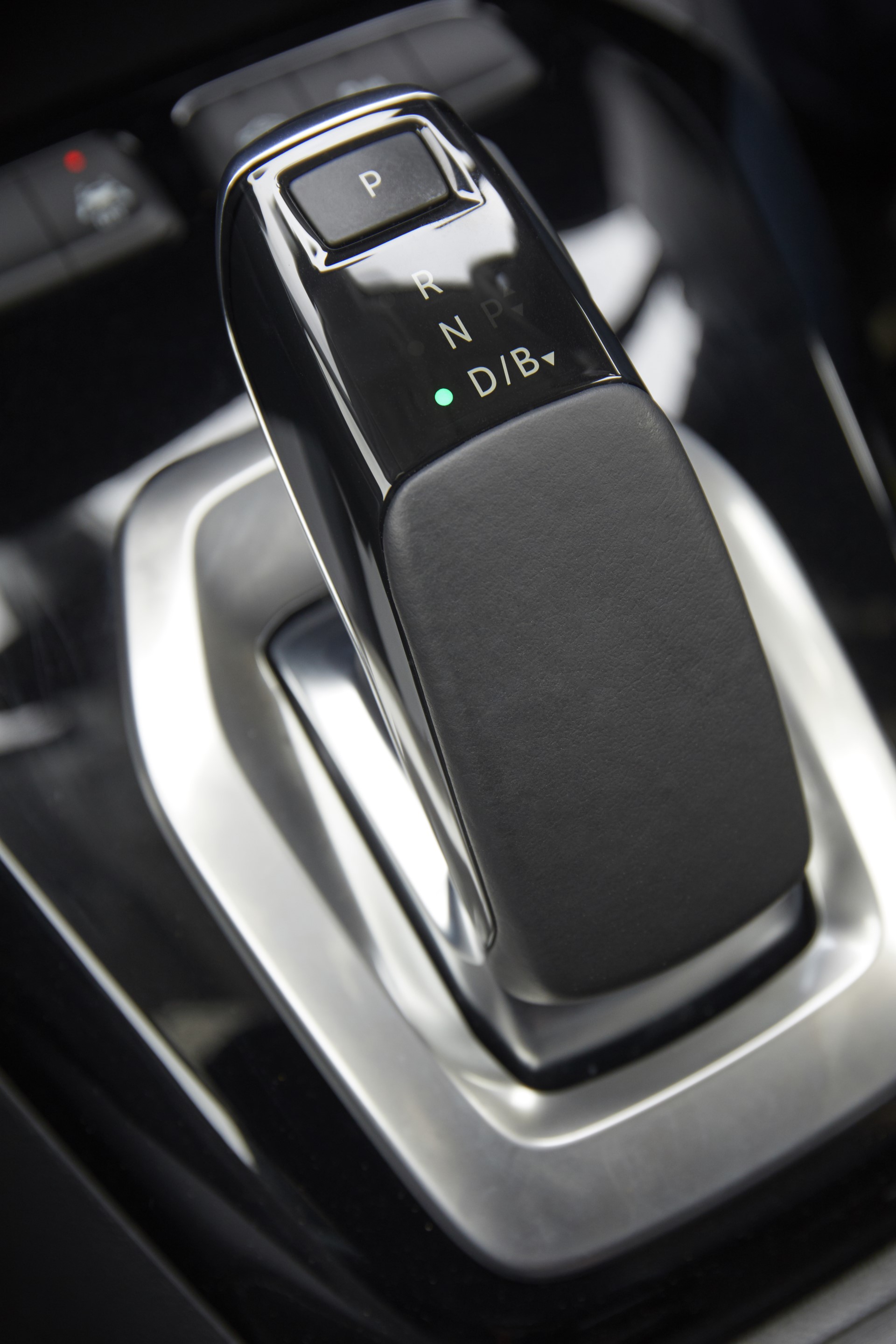 The mode selection stick in the Vauxhall Corsa E positioned where the gearstick would be in a manual vehicle