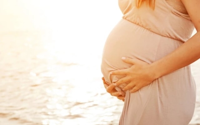 Pregnant women enjoying her babymoon